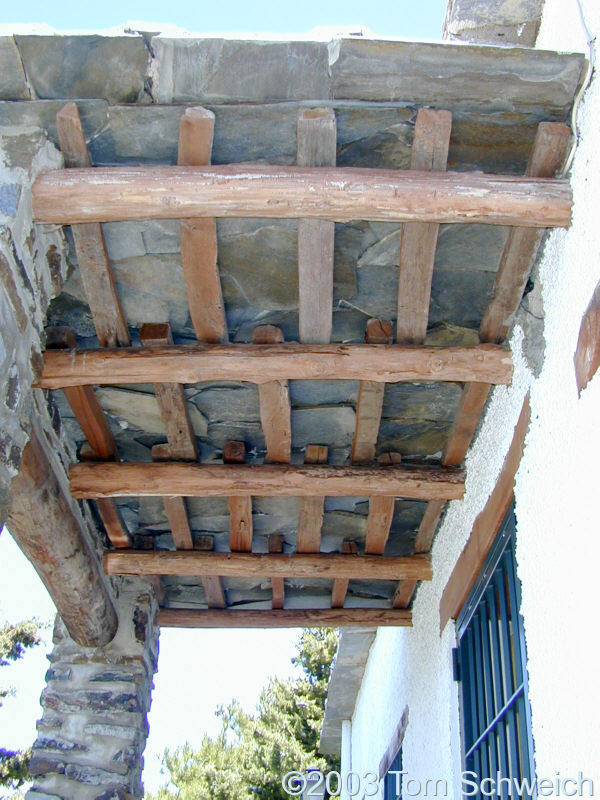 Ceiling construction with chestnut beams and slate.