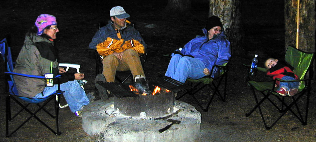 Becci, Matt, Cheryl, and Simone around the fire at Lost Lake, CO.